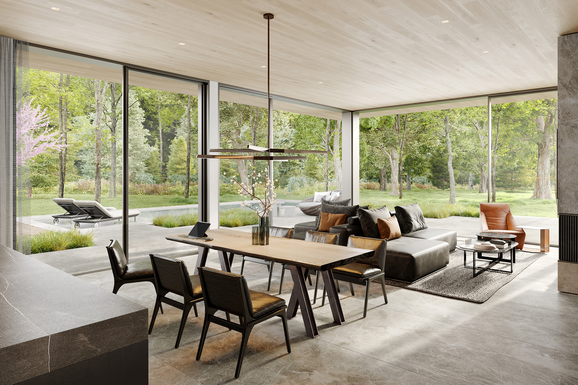 The Shimla House interior rendering A modern industrial great room with large glass windows and doors that open to a patio with a pool and surrounded by trees